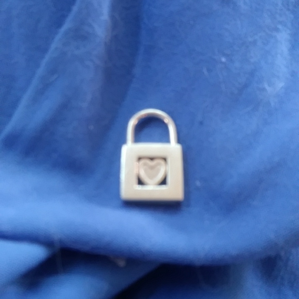 Sterling 925 heart locket charm marked tiffany&co 925 on bottom